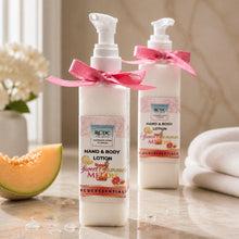 Two bottles of RDC Essentials Sweet Summer Melon hand and body lotion with a pink bow on a wooden surface.
